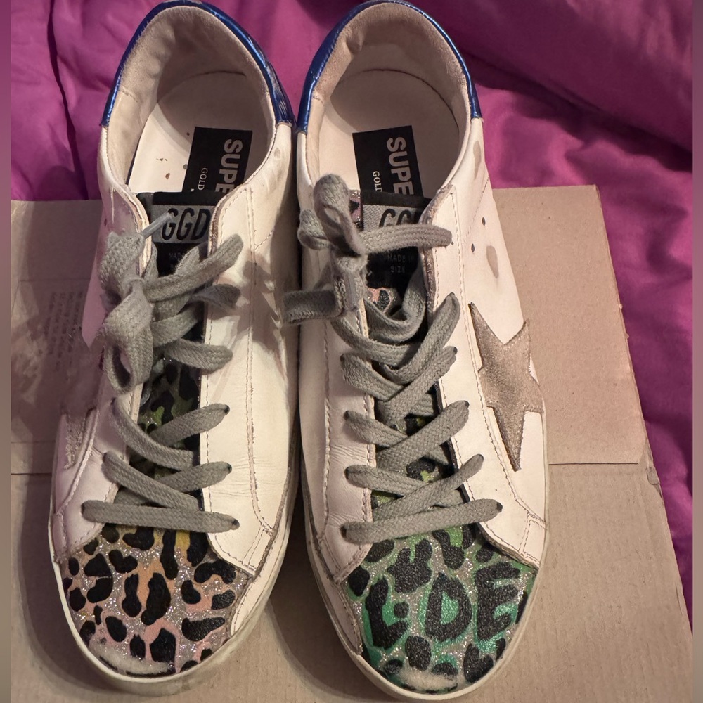 Golden Goose sneakers!!! Perfect for animal print lovers, even your fave team!